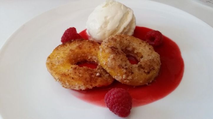 Almond-crusted donut peaches